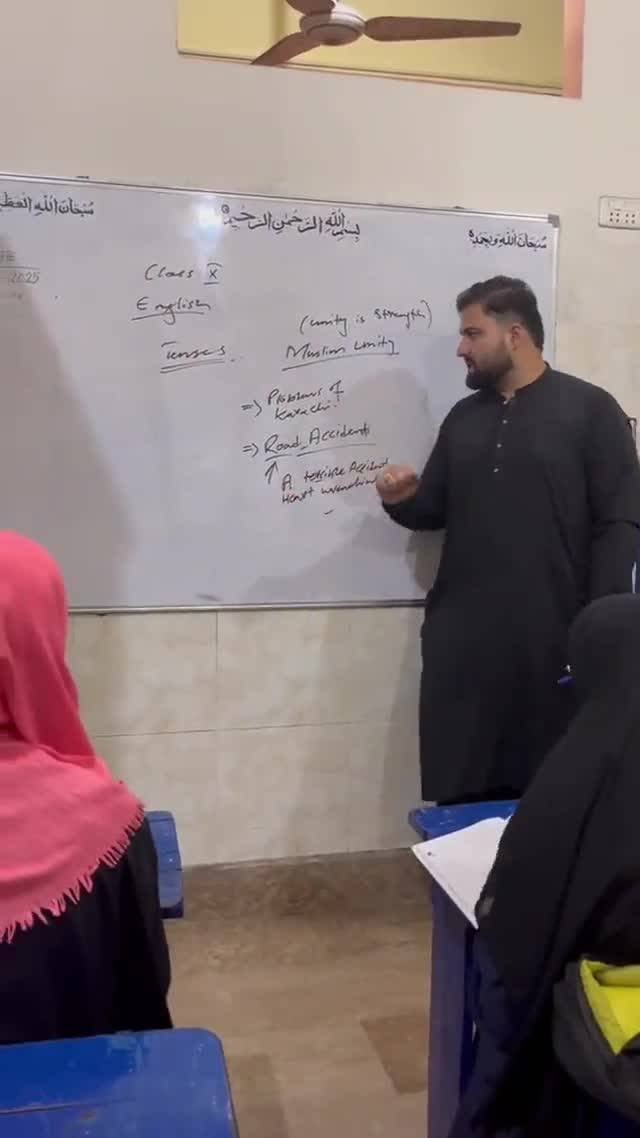 Teacher explaining on the board